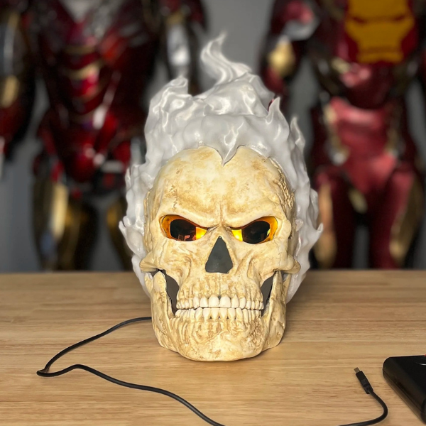 Skull mask with hair made of fire and night-vision eyes.